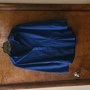 Bright medium blue button-down, 3/4 length sleeve blouse.